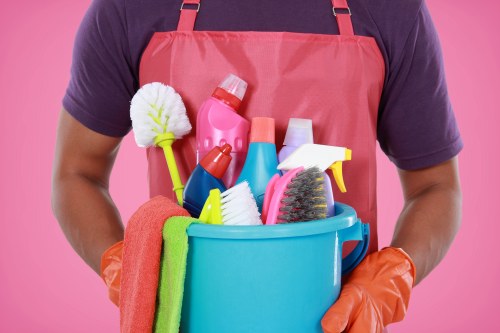 Professional office cleaning in a Putney workplace with desks and shared areas