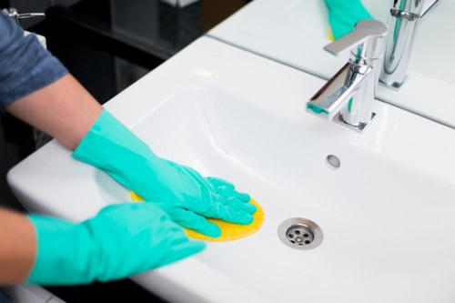 Local cleaners preparing a Putney flat for new occupants