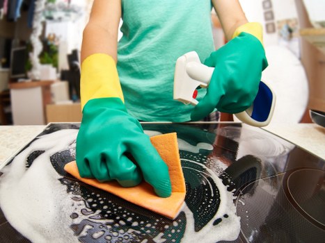 Cleaner carrying out a scheduled property clean